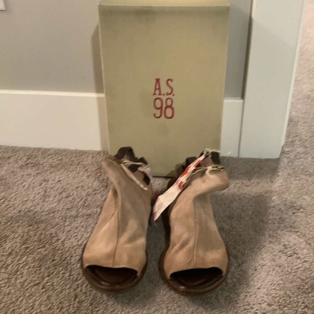 New in box AS98 Gage sandal. Taupe leather with brown straps & details.